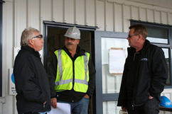 Jack, Steve and Paul take a minute to work on logistics.